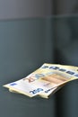 200 euro bill, cash or notes with dark background. Finances or currency background for economic growth