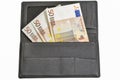 Euro bills in black leather wallet isolated on white Royalty Free Stock Photo