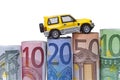 Euro bills & car isolated