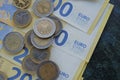 Euro bills and coins.Money.Finance and savings. 200 euro banknotes.One and two euro coins. Finance and savings. Cash Royalty Free Stock Photo