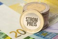 Euro bills and coins and price for the electricity Royalty Free Stock Photo