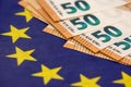 50 euro bills on glag of Europe Royalty Free Stock Photo