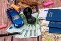Euro bills for a travel, car, maps, passport, and other stuff for adventure Royalty Free Stock Photo