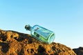 100 euro in a bottle on the beach Royalty Free Stock Photo