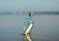 50 euro in a bottle on the beach Royalty Free Stock Photo