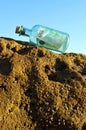 100 euro in a bottle on the beach Royalty Free Stock Photo