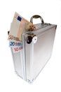 Euro cash in silver suitcase isolated