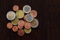 Euro cent coins on wood table. Royalty Free Stock Photo