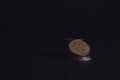 50 Euro cents on a black background. A fifty cent coin stands beautiful wallpaper money Royalty Free Stock Photo