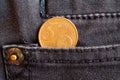 Euro coin with a denomination of 5 euro cents in the pocket of gray denim jeans Royalty Free Stock Photo