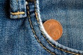 Euro coin with a denomination of two euro cent in the pocket of obsolete blue denim jeans Royalty Free Stock Photo