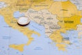 Euro coin on Mediterranean County map. Royalty Free Stock Photo