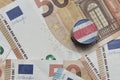 euro coin with national flag of costa rica on the euro money banknotes background