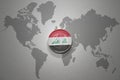 Euro coin with national flag of iraq on the gray world map background.3d illustration