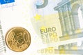 Euro coin on new five euro banknote Royalty Free Stock Photo