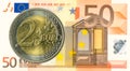 5 euro coins against 50 euro bank note obverse Royalty Free Stock Photo