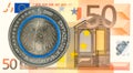 5 euro coins against 50 euro bank note obverse Royalty Free Stock Photo