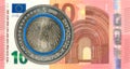 5 euro coins against 10 euro bank note obverse Royalty Free Stock Photo