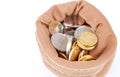 Euro coins in cloth bags