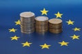 Euro coins, European Union, over flag Royalty Free Stock Photo