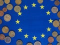 Euro coins, European Union, over flag Royalty Free Stock Photo