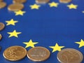 Euro coins, European Union, over flag Royalty Free Stock Photo