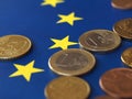 Euro coins, European Union, over flag Royalty Free Stock Photo