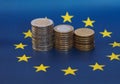 Euro coins, European Union, over flag Royalty Free Stock Photo