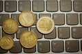 Euro coins on laptop& x27;s keyboard Royalty Free Stock Photo