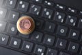 Euro coins lie in the form of a pyramid on a laptop keyboard Royalty Free Stock Photo