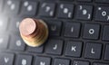 Euro coins lie in the form of a pyramid on a laptop keyboard Royalty Free Stock Photo