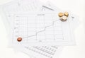 Euro coins on the line chart and the data table Royalty Free Stock Photo