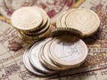 Euro coins over the old world map. Royalty Free Stock Photo