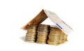 Euro Coins pile House with banknote roof