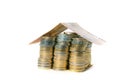 Euro Coins pile House with banknote roof