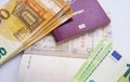 Euro currency and passport visa stamps