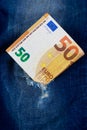 Euro in a denim hole Royalty Free Stock Photo