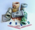Euro dollar bank notes money in rolls Royalty Free Stock Photo