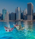 Euro and dollar boats against cityscape Royalty Free Stock Photo