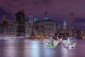 The euro and dollar boats against cityscape Royalty Free Stock Photo