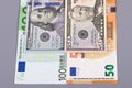 100 euro 50 dollar money on gray background. Royalty Free Stock Photo