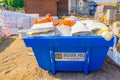 Euro milieu steel bin full of construction waste, Eco friendly solutions, Consturction site in Rucphen, The Netherlands, 6 may,