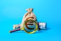 Euro money bag and magnifying glass. Investigating capital origins. Anti money laundering and tax evasion. Find investment funds