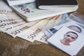 Euro money banknote visa passport and photograph of man on wood