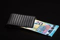 20 Euro money banknotes in black wallet isolated Royalty Free Stock Photo