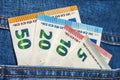 Euro money banknotes in a pocket of blue jeans close up Royalty Free Stock Photo