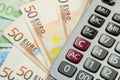 Euro money bills and calculator Royalty Free Stock Photo
