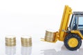 Euro money coins and forklift
