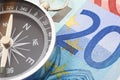 Euro money and compass Royalty Free Stock Photo