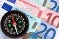 Euro money and compass Royalty Free Stock Photo